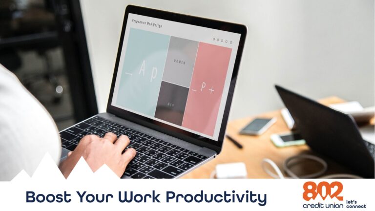 Image of a laptop in a woman's hands with office work on screen.